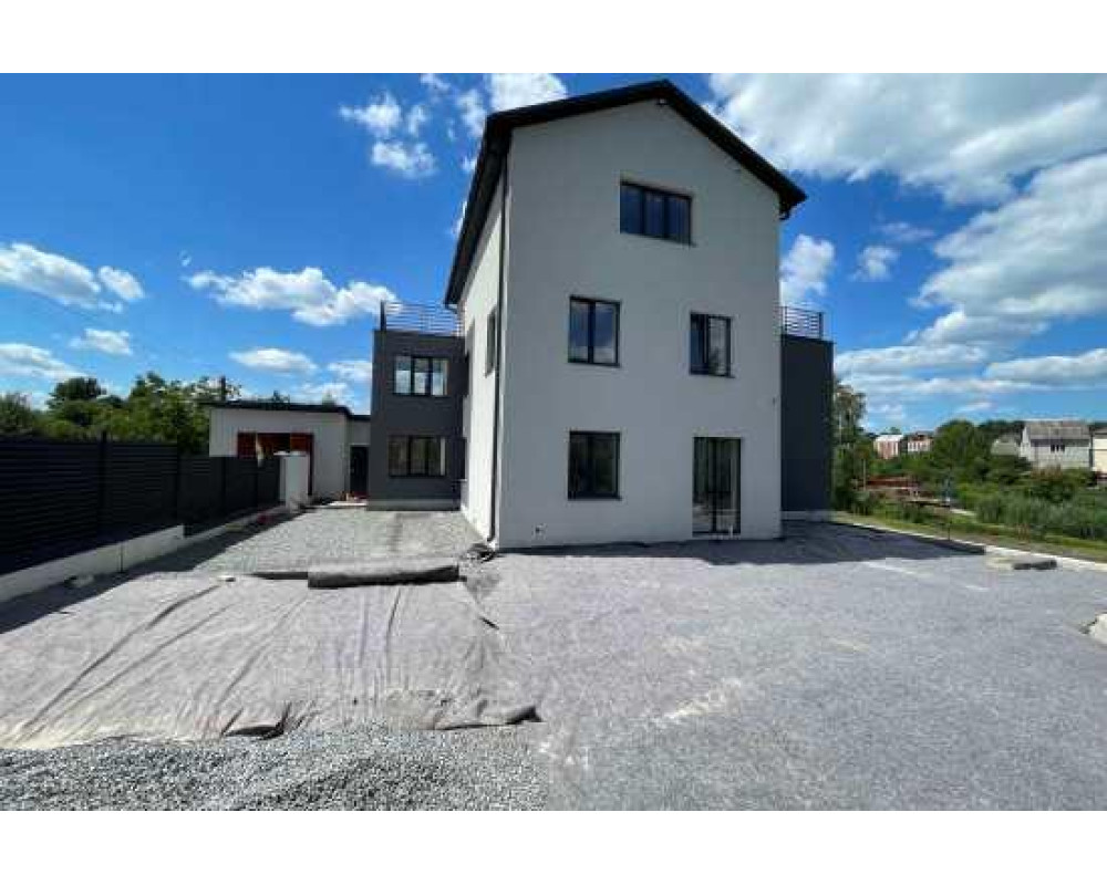 Укладка тротуарной плитки с использованием геотекстиля в частном доме в г. Шепетовка