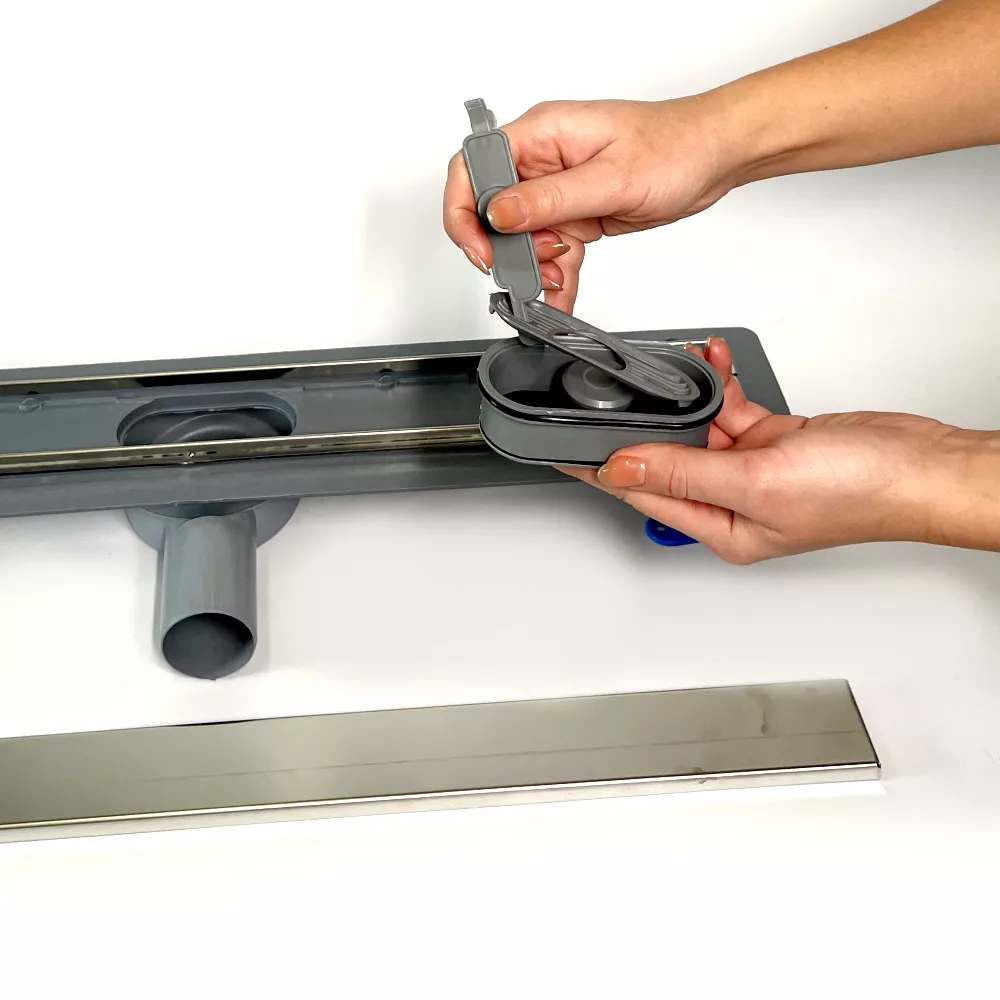 Сливной трап для душа с поворотным сифоном 360, решетка "ПОД ПЛИТКУ" 60 см, нержавеющая кромка Сливной трап для душа с поворотным сифоном 360, решетка "ПОД ПЛИТКУ" 60 см, нержавеющая кромка