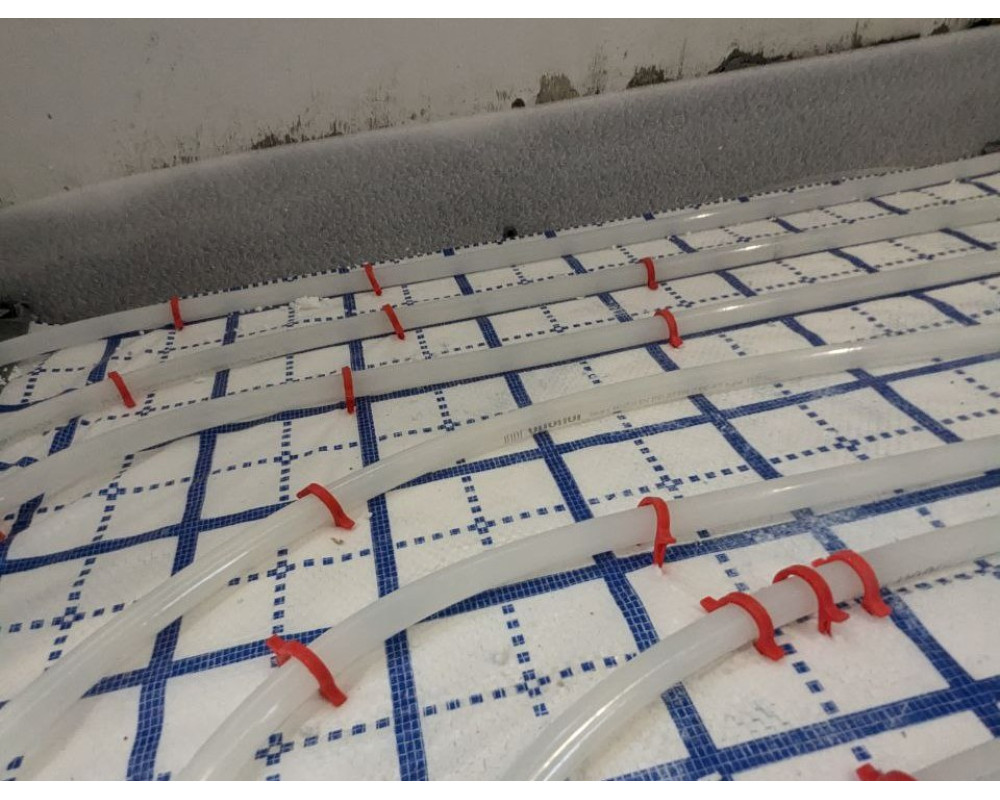 Installation of a warm water floor in a private house in the Kyiv region