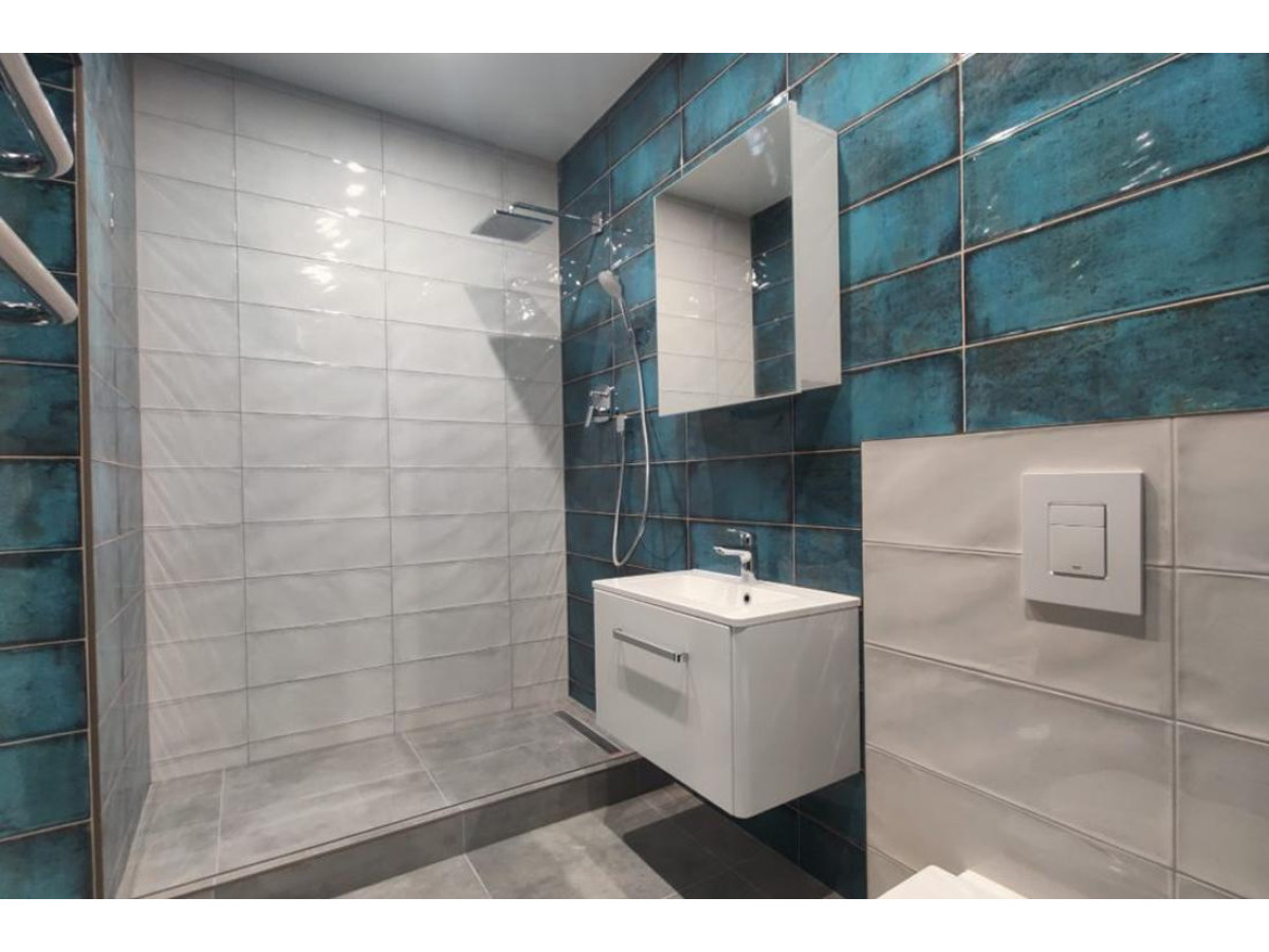 Диспенсер для туалетного паперу з боковим витягуванням