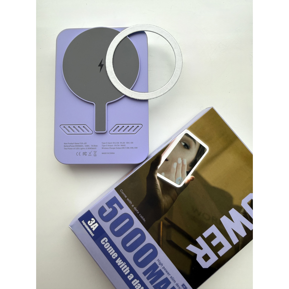 Power bank 5000 mAh with wireless charging, built-in mirror and LED light, purple color