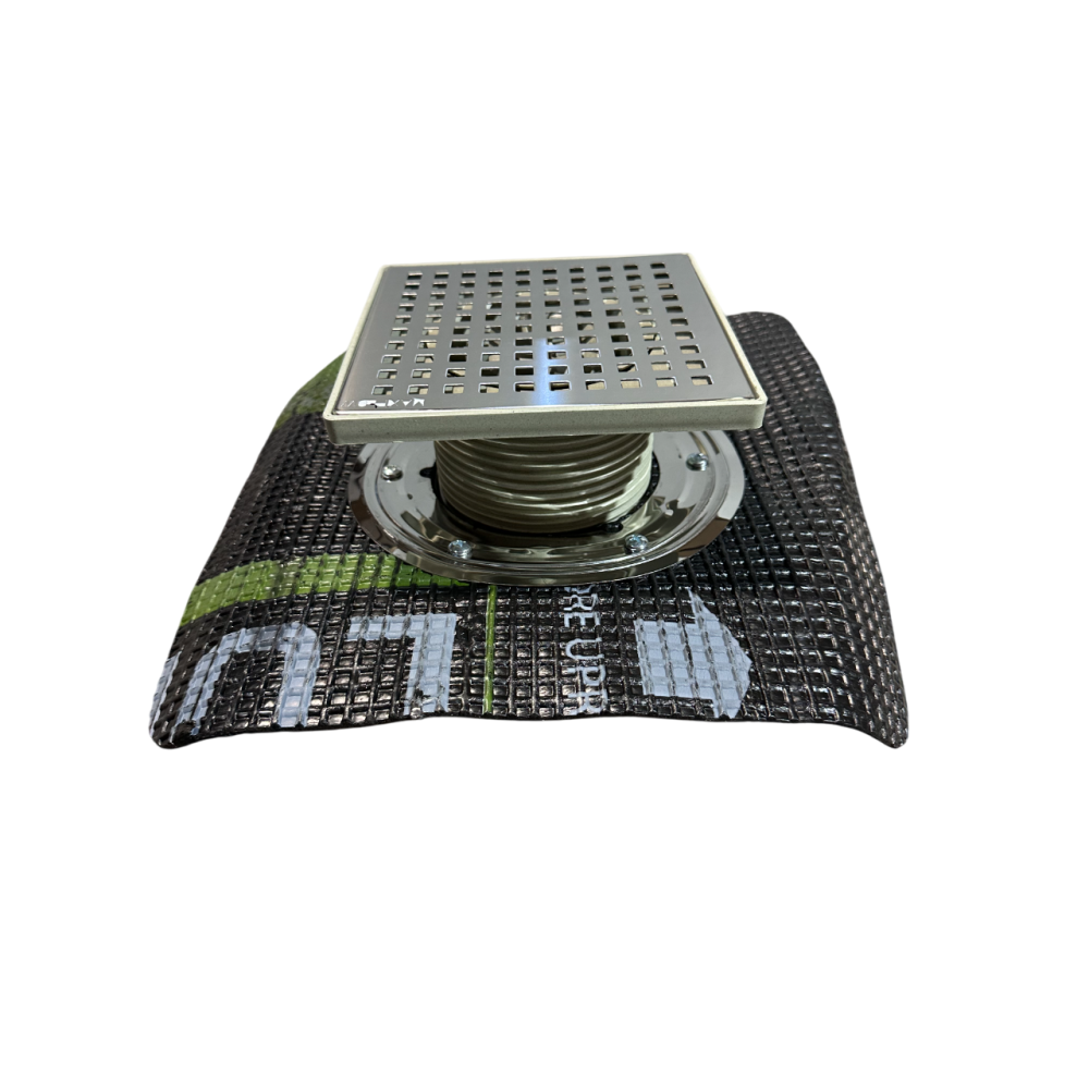 Двокорпусний трап вертикальний вихід D50, 15*15 см з притискним фланцем і бітумною мембраною Двокорпусний трап вертикальний вихід D50, 15*15 см з притискним фланцем і бітумною мембраною