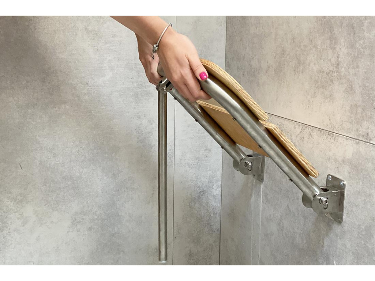 Виды откидных сидений для ванной и их назначение