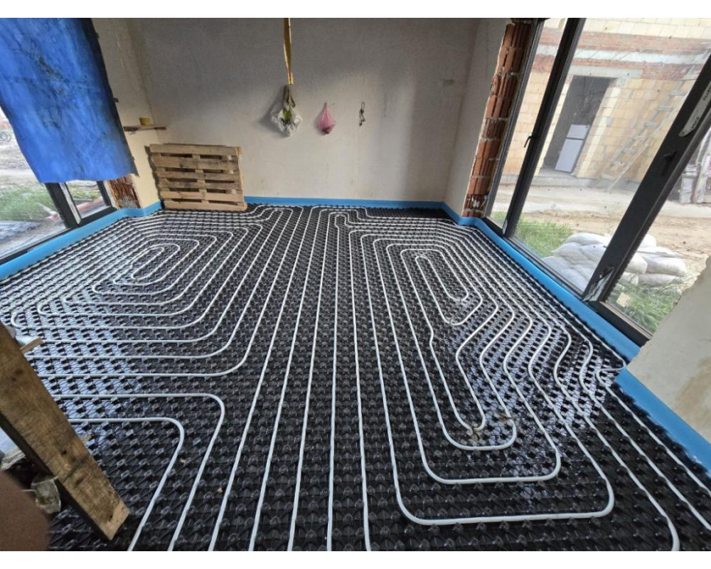 Modern underfloor heating system in a private cottage